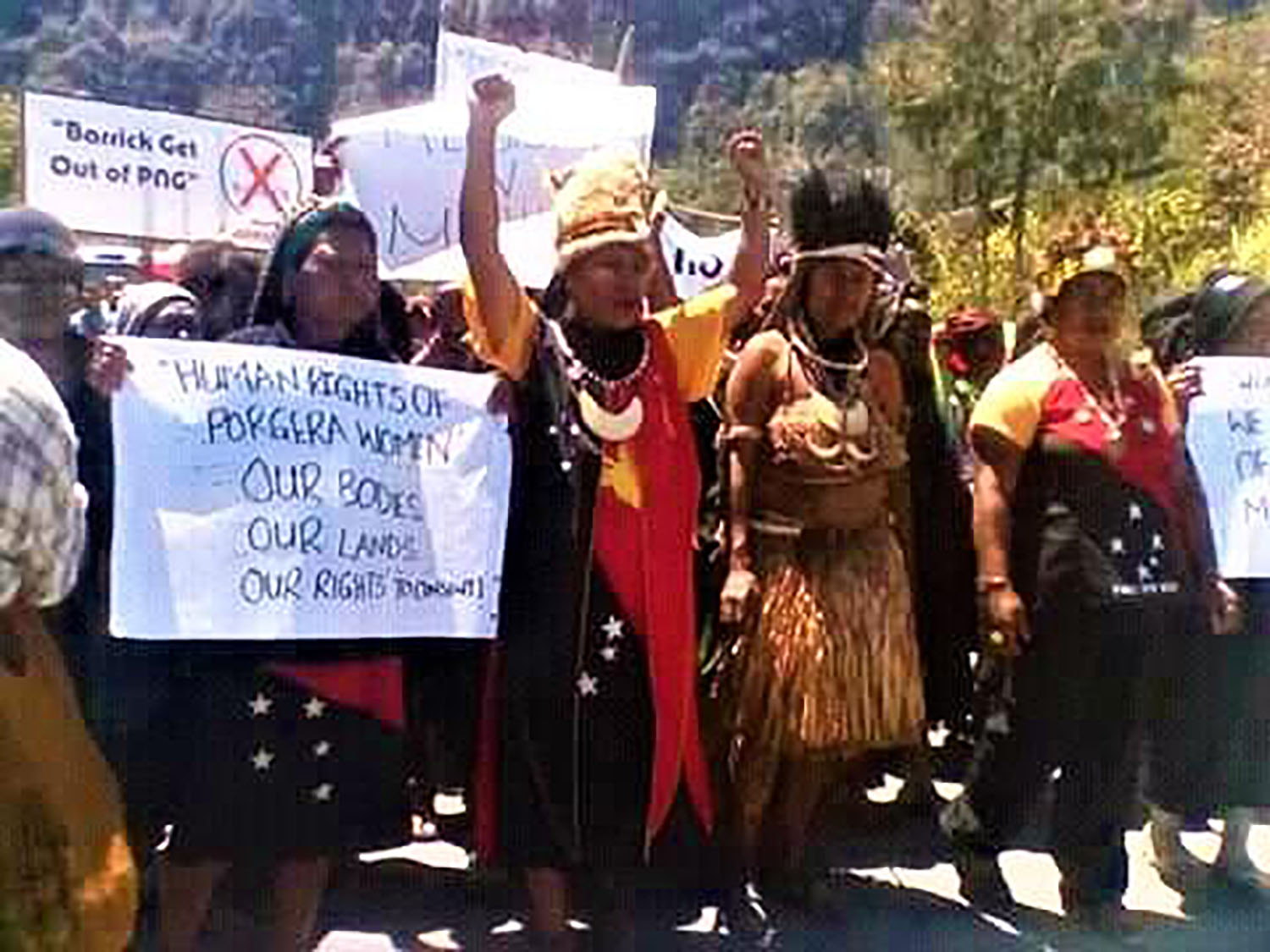 Group of indigenous protestors at a gold mine